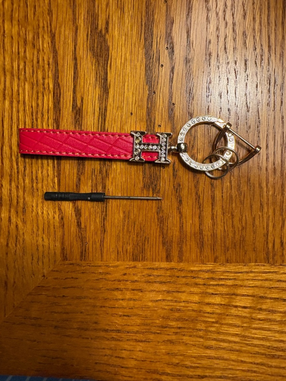 Red Vegan Leather Keychain with Gold Tone Crystal Accents - Picture 2 of 3